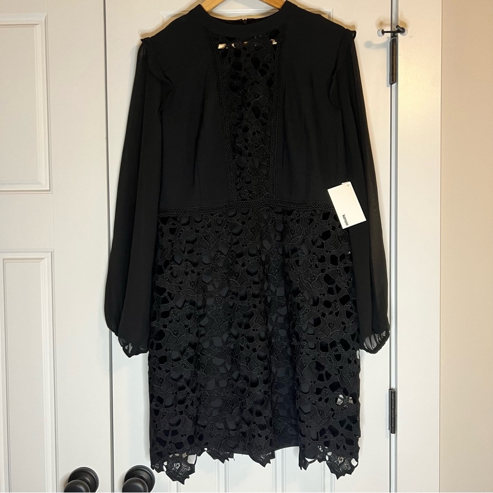 NWT Kensie little black dress with embroidery details and sheer long sleeves.